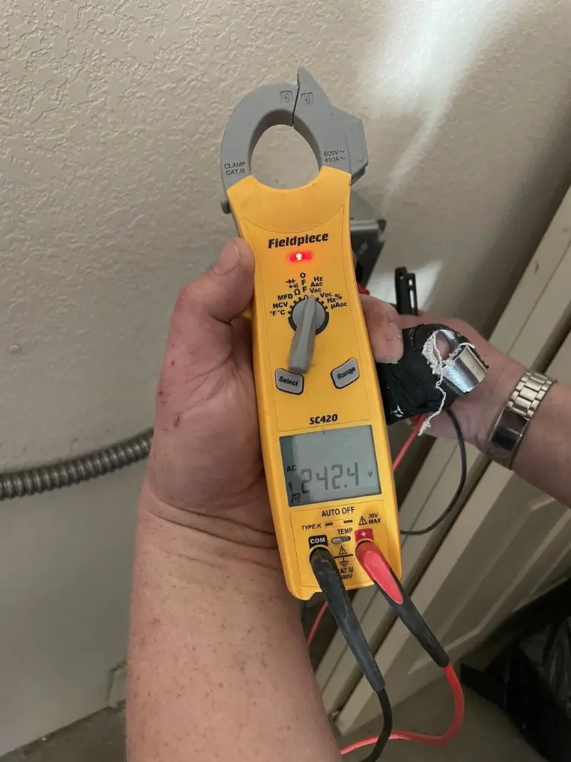 Voltage testing with clamp meter during Generator Installation in Waldorf